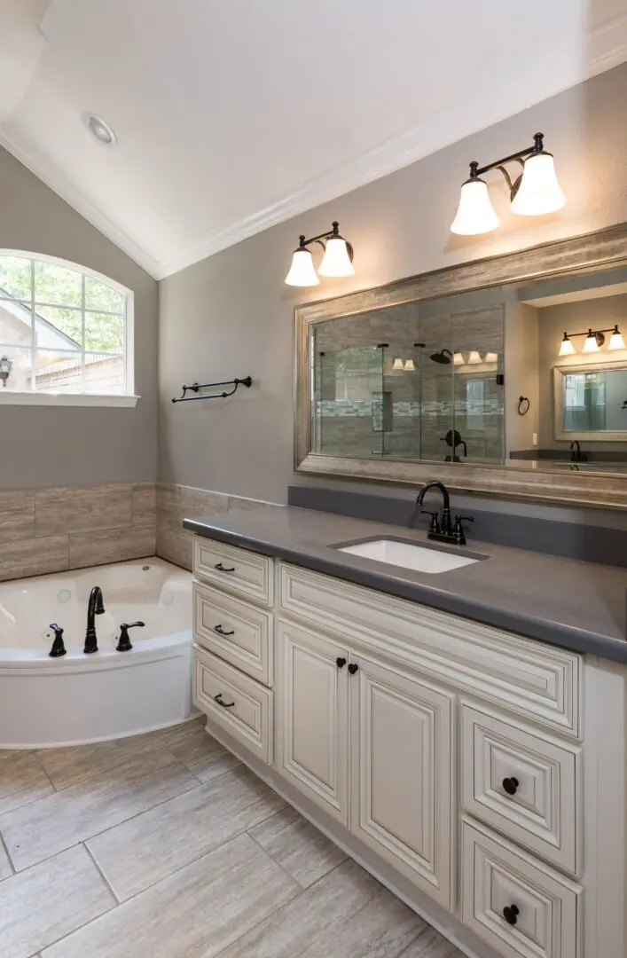 Elegant bathroom with vanity and tub.