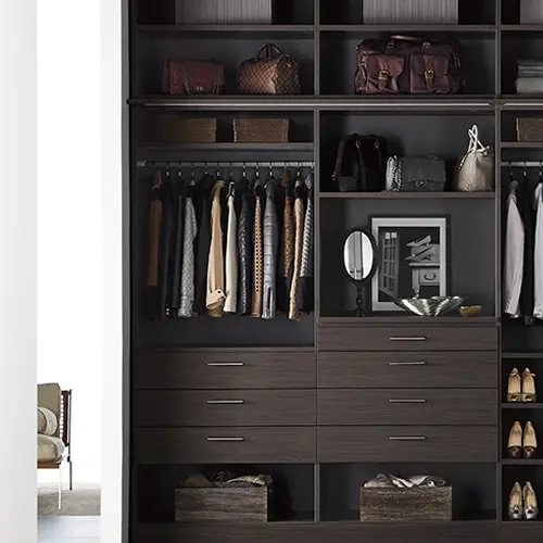 Organized modern walk-in closet.