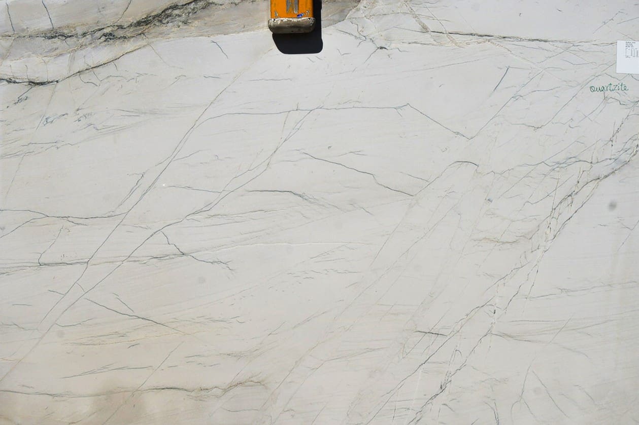 White quartzite slab with grey veining.